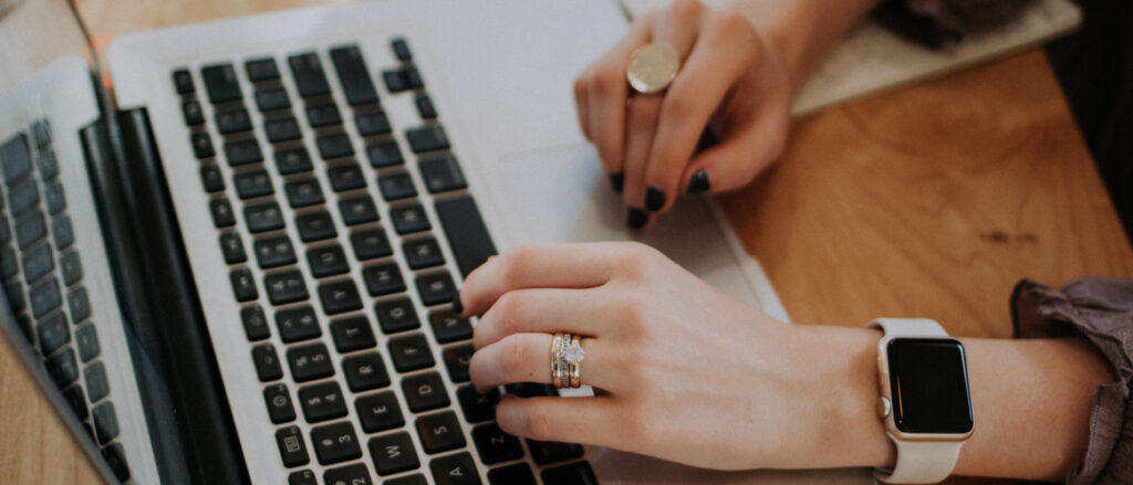 Picture of a person working on a laptop