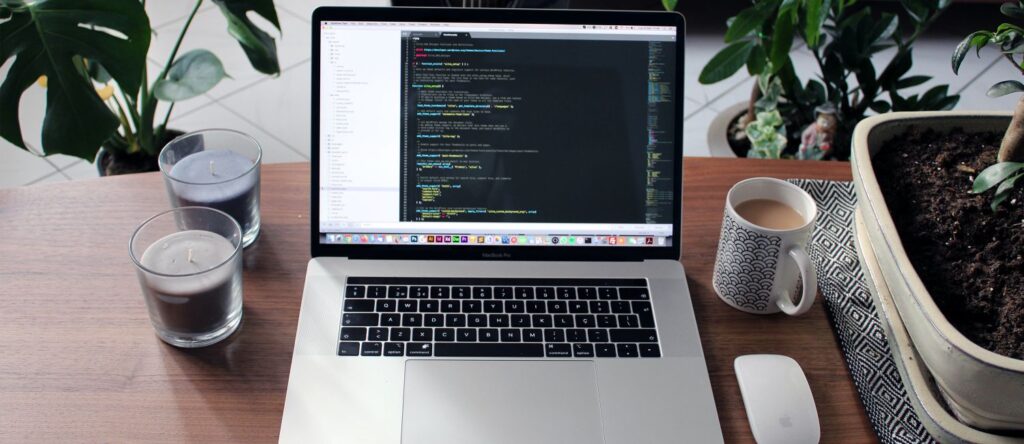 Picture of a codeon a table and a cup of coffee